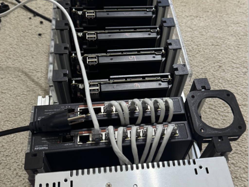 Final fitment into the case - Display and Raspberry Pi mounted into the lid for observability of the cluster. Time to go to the next show! (KubeCon + CloudNativeCon NA)